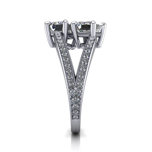 Malani emerald three stone engagement ring in 14K White Gold, side profile showing the split shank dividing into two pav&eacute; rows beneath the two-stone head