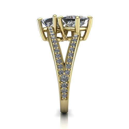 Malani princess three stone engagement ring in 14K Yellow Gold, side profile showing the split shank dividing into two pav&eacute; rows beneath the two-stone head