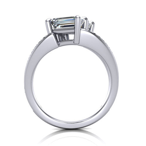 Malani emerald three stone engagement ring in 18K White Gold, through-finger front profile showing the two-stone head raised above the pav&eacute; split band