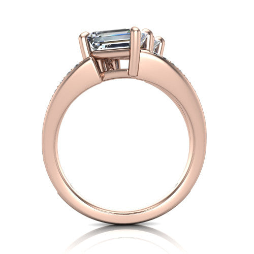 Malani emerald three stone engagement ring in 18K Rose Gold, through-finger front profile showing the two-stone head raised above the pav&eacute; split band