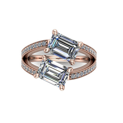 Malani emerald three stone engagement ring in 18K Rose Gold, top-down view showing the two diamonds in a toi et moi arrangement where the split shank meets the head