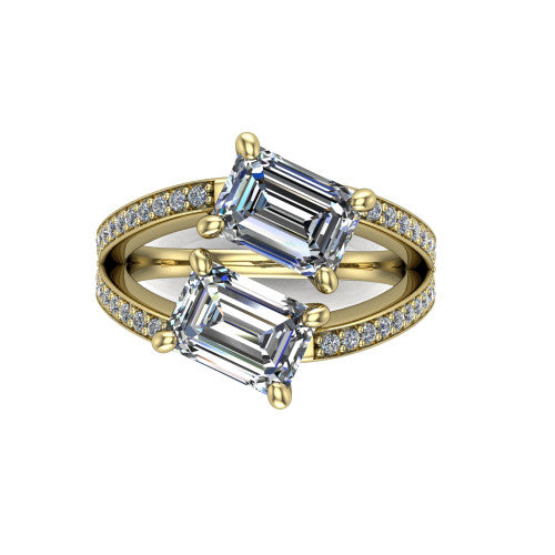Malani emerald three stone engagement ring in 14K Yellow Gold, top-down view showing the two diamonds in a toi et moi arrangement where the split shank meets the head