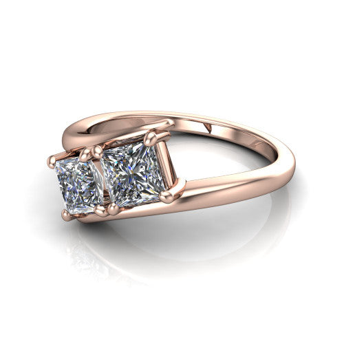 Alayna princess three stone engagement ring in 14K Rose Gold, three-quarter perspective showing two diamonds set diagonally in claw baskets on a polished bypass swirl shank