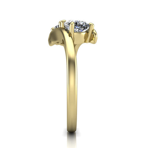 Alayna cushion three stone engagement ring in 18K Yellow Gold, side profile showing the bypass swirl shoulders crossing beneath the two-stone head
