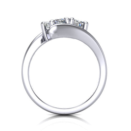 Alayna emerald three stone engagement ring in 18K White Gold, through-finger front profile showing the two-stone head and the smooth polished bypass band