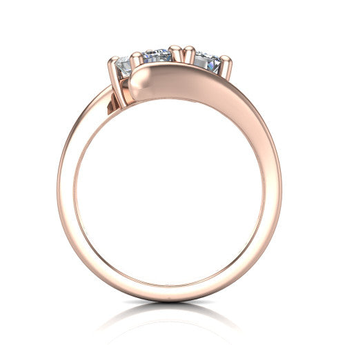 Alayna emerald three stone engagement ring in 14K Rose Gold, through-finger front profile showing the two-stone head and the smooth polished bypass band