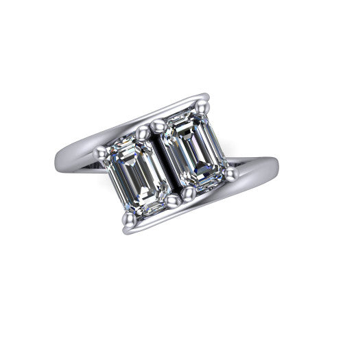 Alayna emerald three stone engagement ring in Platinum, top-down view showing the two diamonds set diagonally in a toi et moi arrangement above the open band