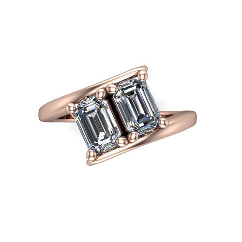 Alayna emerald three stone engagement ring in 14K Rose Gold, top-down view showing the two diamonds set diagonally in a toi et moi arrangement above the open band