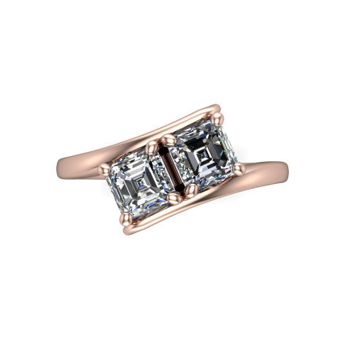 Alayna asscher three stone engagement ring in 18K Rose Gold, top-down view showing the two diamonds set diagonally in a toi et moi arrangement above the open band
