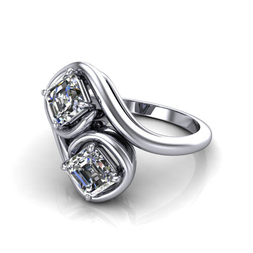 Daniela asscher three stone engagement ring in 14K White Gold, three-quarter perspective showing two asscher cut diamonds half-bezel set diagonally on a polished bypass shank