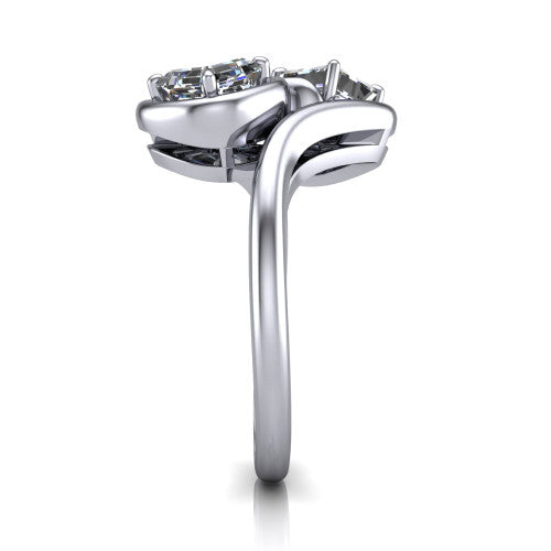 Daniela asscher three stone engagement ring in Platinum, side profile showing the bypass shank sweeping up and crossing behind the two-stone head