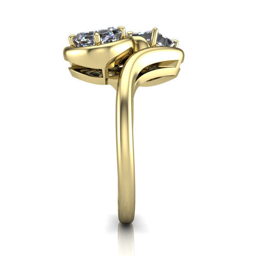 Daniela asscher three stone engagement ring in 14K Yellow Gold, side profile showing the bypass shank sweeping up and crossing behind the two-stone head
