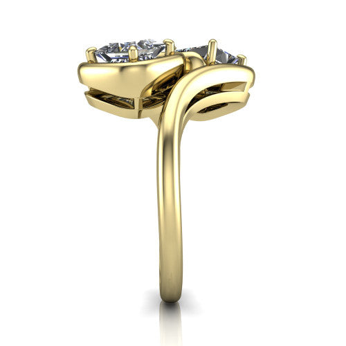 Daniela princess three stone engagement ring in 14K Yellow Gold, side profile showing the bypass shank sweeping up and crossing behind the two-stone head