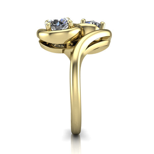 Daniela round three stone engagement ring in 18K Yellow Gold, side profile showing the bypass shank sweeping up and crossing behind the two-stone head