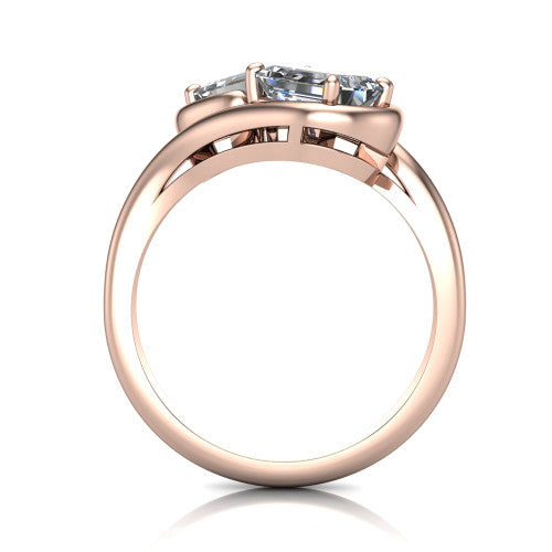 Daniela cushion three stone engagement ring in 18K Rose Gold, through-finger front profile showing the two-stone head and polished bypass band