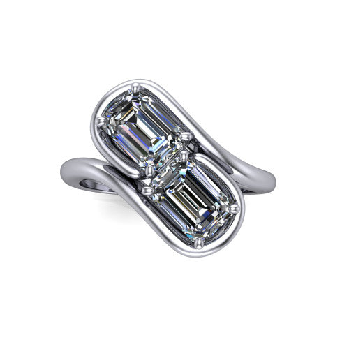Daniela emerald three stone engagement ring in 14K White Gold, top-down view showing two emerald cut diamonds set diagonally in a toi et moi arrangement within protective half-bezels