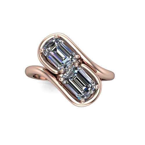 Daniela cushion three stone engagement ring in 14K Rose Gold, top-down view showing two cushion cut diamonds set diagonally in a toi et moi arrangement within protective half-bezels