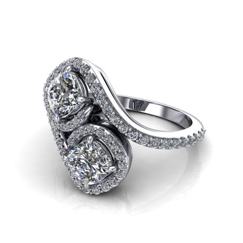 Jane cushion three stone engagement ring in 18K White Gold, three-quarter perspective showing two cushion cut diamonds set diagonally in twin square halos on a pave wraparound shank with bypass swirling shoulders