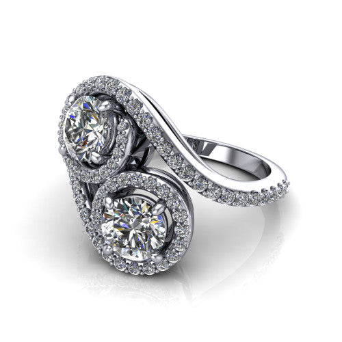 Jane round three stone engagement ring in 14K White Gold, three-quarter perspective showing two brilliant round diamonds set diagonally in twin square halos on a pave wraparound shank with bypass swirling shoulders