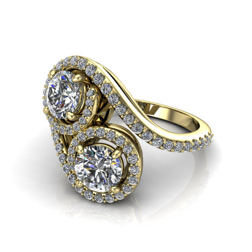 Jane round three stone engagement ring in 18K Yellow Gold, three-quarter perspective showing two brilliant round diamonds set diagonally in twin square halos on a pave wraparound shank with bypass swirling shoulders