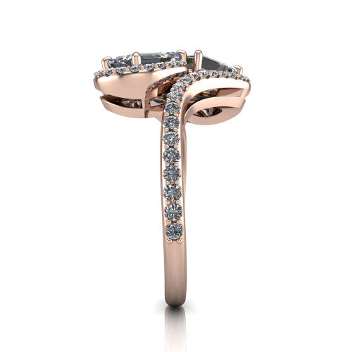 Jane emerald three stone engagement ring in 18K Rose Gold, side profile showing the bypass swirling shoulders and pave diamonds wrapping the top and outer sides of the shank