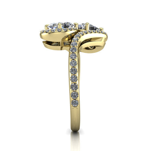 Jane oval three stone engagement ring in 14K Yellow Gold, side profile showing the bypass swirling shoulders and pave diamonds wrapping the top and outer sides of the shank