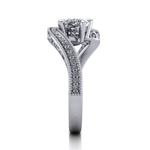 Stevie cushion three stone engagement ring in Platinum, side profile showing the engraved filigree scrolls, pave diamond center row, and milgrain bead borders along the band