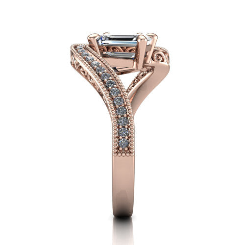 Stevie emerald three stone engagement ring in 14K Rose Gold, side profile showing the engraved filigree scrolls, pave diamond center row, and milgrain bead borders along the band