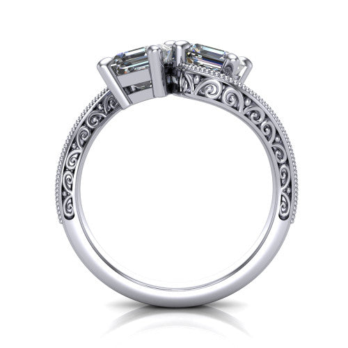 Stevie square emerald three stone engagement ring in Platinum, through-finger front profile showing the two-stone head, filigree shoulders, milgrain band edges, and pave center row