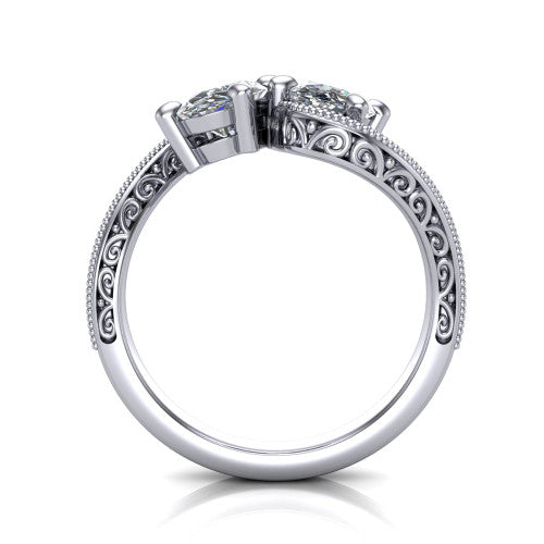 Stevie oval three stone engagement ring in Platinum, through-finger front profile showing the two-stone head, filigree shoulders, milgrain band edges, and pave center row