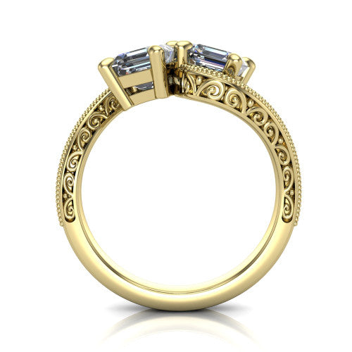Stevie square emerald three stone engagement ring in 14K Yellow Gold, through-finger front profile showing the two-stone head, filigree shoulders, milgrain band edges, and pave center row