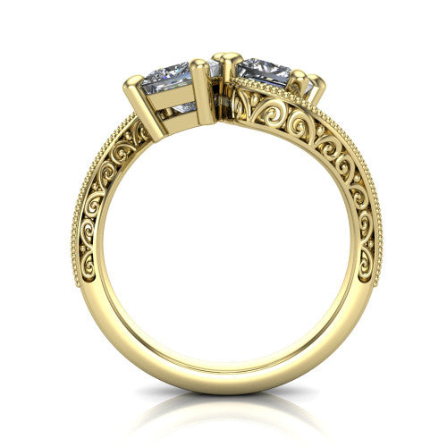Stevie princess three stone engagement ring in 14K Yellow Gold, through-finger front profile showing the two-stone head, filigree shoulders, milgrain band edges, and pave center row