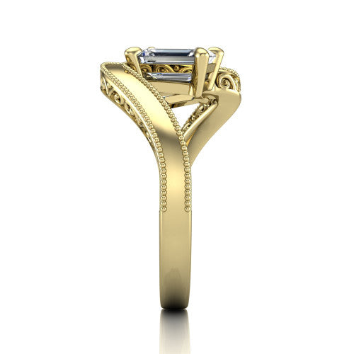 Logan emerald three stone engagement ring in 18K Yellow Gold, side profile showing the hand-engraved filigree shoulders and milgrain bead borders along the band