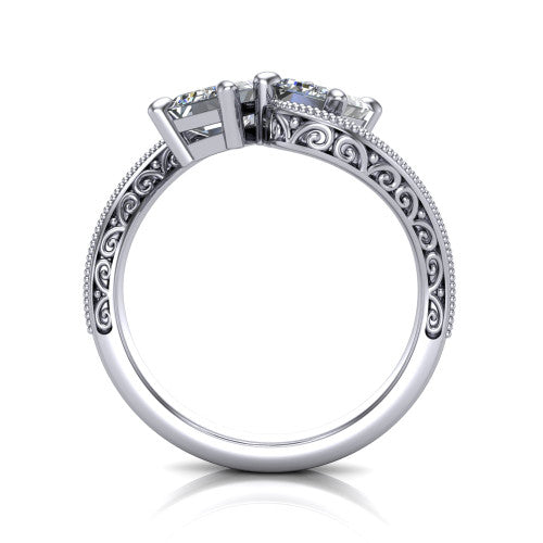 Logan emerald three stone engagement ring in 14K White Gold, through-finger front profile showing the two-stone head, filigree scrollwork, and milgrain band edges