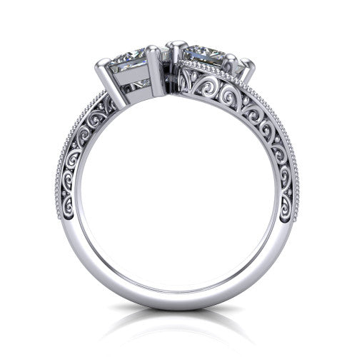 Logan princess three stone engagement ring in 18K White Gold, through-finger front profile showing the two-stone head, filigree scrollwork, and milgrain band edges