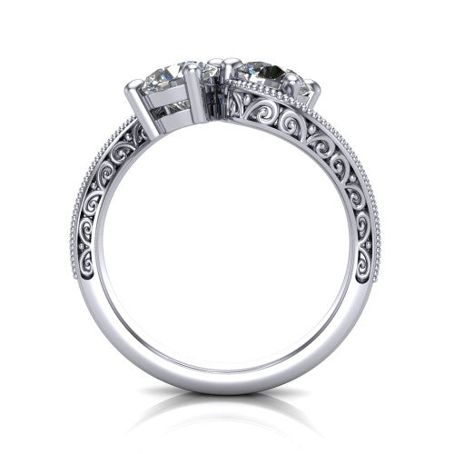 Logan round three stone engagement ring in 18K White Gold, through-finger front profile showing the two-stone head, filigree scrollwork, and milgrain band edges