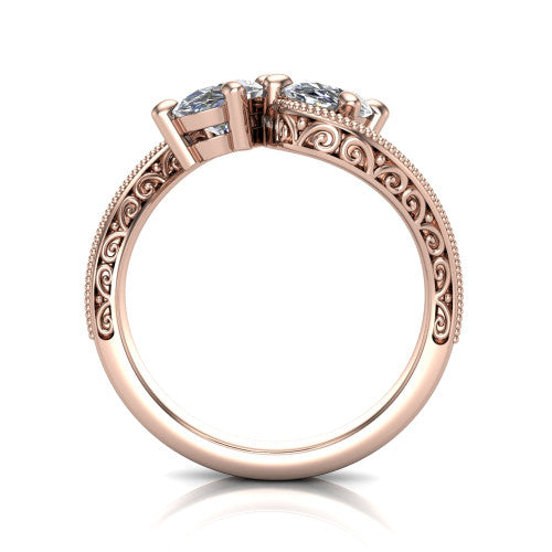 Logan oval three stone engagement ring in 18K Rose Gold, through-finger front profile showing the two-stone head, filigree scrollwork, and milgrain band edges