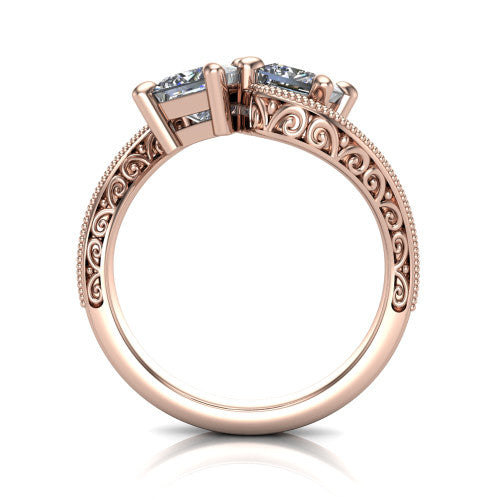 Logan princess three stone engagement ring in 18K Rose Gold, through-finger front profile showing the two-stone head, filigree scrollwork, and milgrain band edges