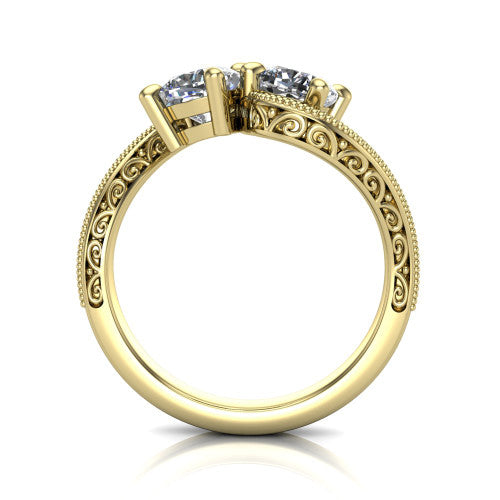Logan cushion three stone engagement ring in 14K Yellow Gold, through-finger front profile showing the two-stone head, filigree scrollwork, and milgrain band edges
