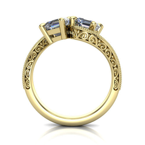 Logan square emerald three stone engagement ring in 14K Yellow Gold, through-finger front profile showing the two-stone head, filigree scrollwork, and milgrain band edges