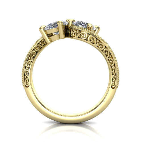 Logan oval three stone engagement ring in 14K Yellow Gold, through-finger front profile showing the two-stone head, filigree scrollwork, and milgrain band edges