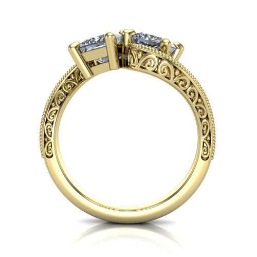 Logan princess three stone engagement ring in 14K Yellow Gold, through-finger front profile showing the two-stone head, filigree scrollwork, and milgrain band edges