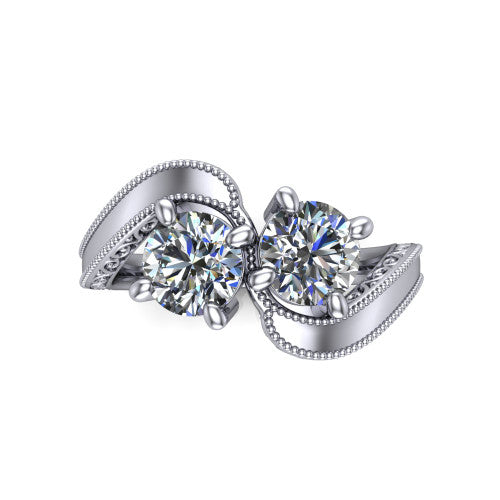 Logan round three stone engagement ring in Platinum, top-down view showing two brilliant round diamonds set diagonally in a toi et moi arrangement above filigree scrollwork shoulders