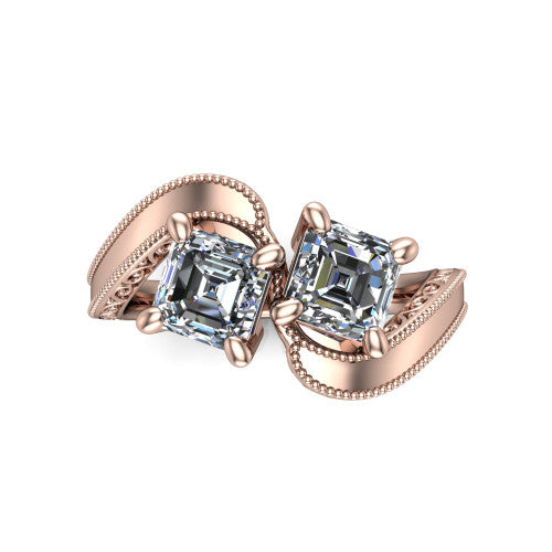 Logan square emerald three stone engagement ring in 18K Rose Gold, top-down view showing two step-cut square emerald diamonds set diagonally in a toi et moi arrangement above filigree scrollwork shoulders
