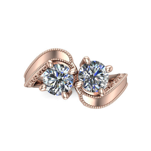 Logan round three stone engagement ring in 18K Rose Gold, top-down view showing two brilliant round diamonds set diagonally in a toi et moi arrangement above filigree scrollwork shoulders