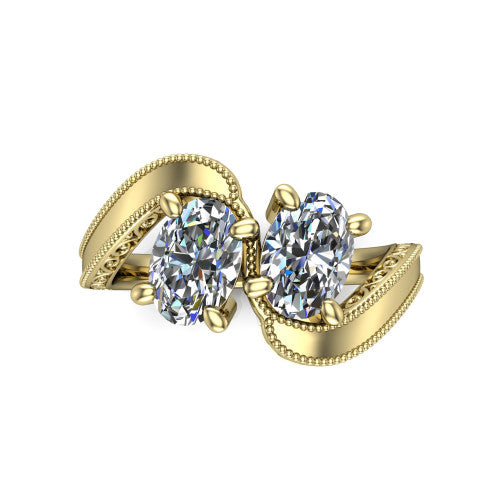 Logan oval three stone engagement ring in 14K Yellow Gold, top-down view showing two brilliant oval diamonds set diagonally in a toi et moi arrangement above filigree scrollwork shoulders