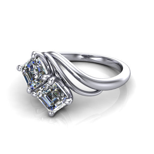 Julianna square emerald three stone engagement ring in Platinum, three-quarter perspective showing two step-cut square emerald diamonds set diagonally on multi-ribbon wrapping shoulders