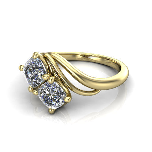 Julianna cushion three stone engagement ring in 14K Yellow Gold, three-quarter perspective showing two brilliant cushion-cut diamonds set diagonally on multi-ribbon wrapping shoulders