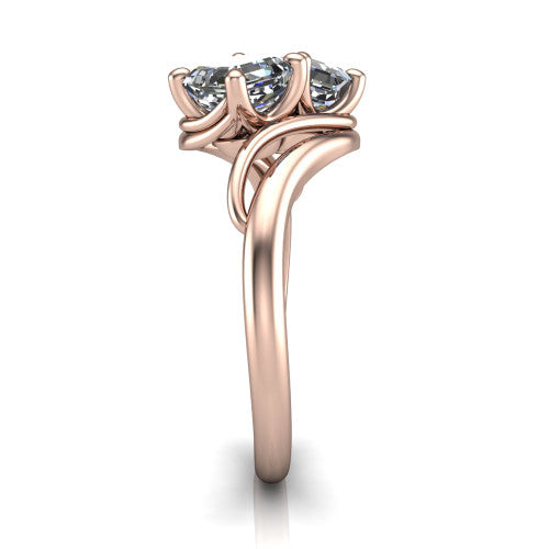 Julianna square emerald three stone engagement ring in 18K Rose Gold, side profile showing the multi-ribbon shoulders curving around the head before rejoining as one band