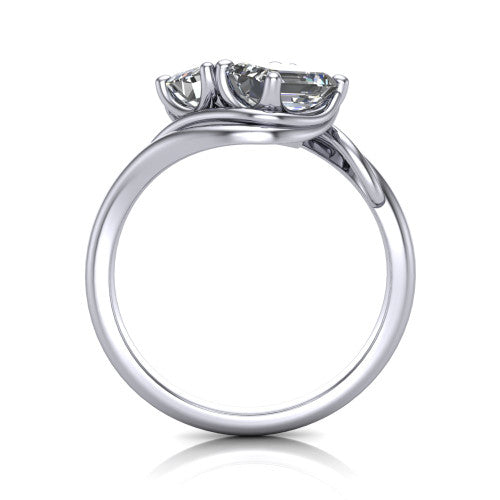 Julianna emerald three stone engagement ring in 18K White Gold, through-finger front profile showing the two-stone head and slim plain band